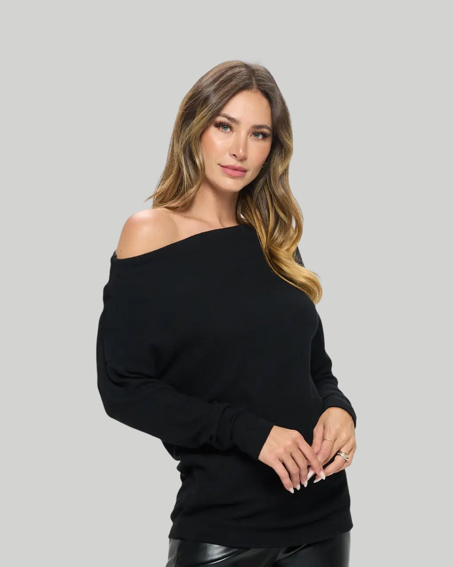 Brushed black knit off the shoulder top