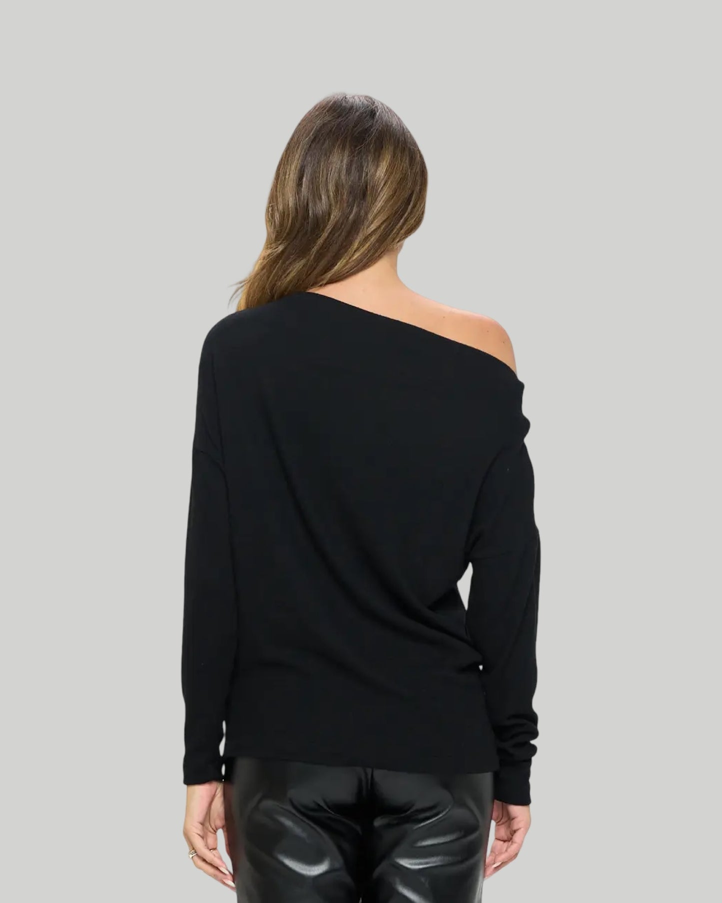 Brushed black knit off the shoulder top