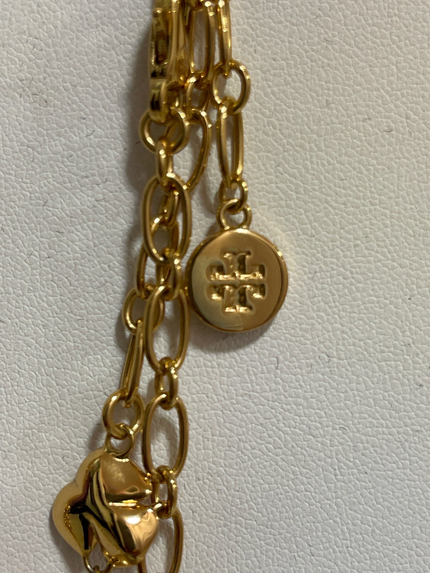 Tory Burch fleur rosary necklace in red and gold. Gold Plated