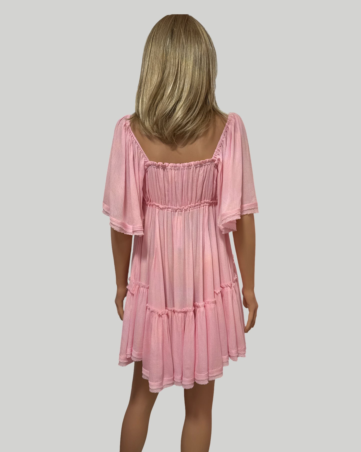Ruffle hem ruched mini dress light pink