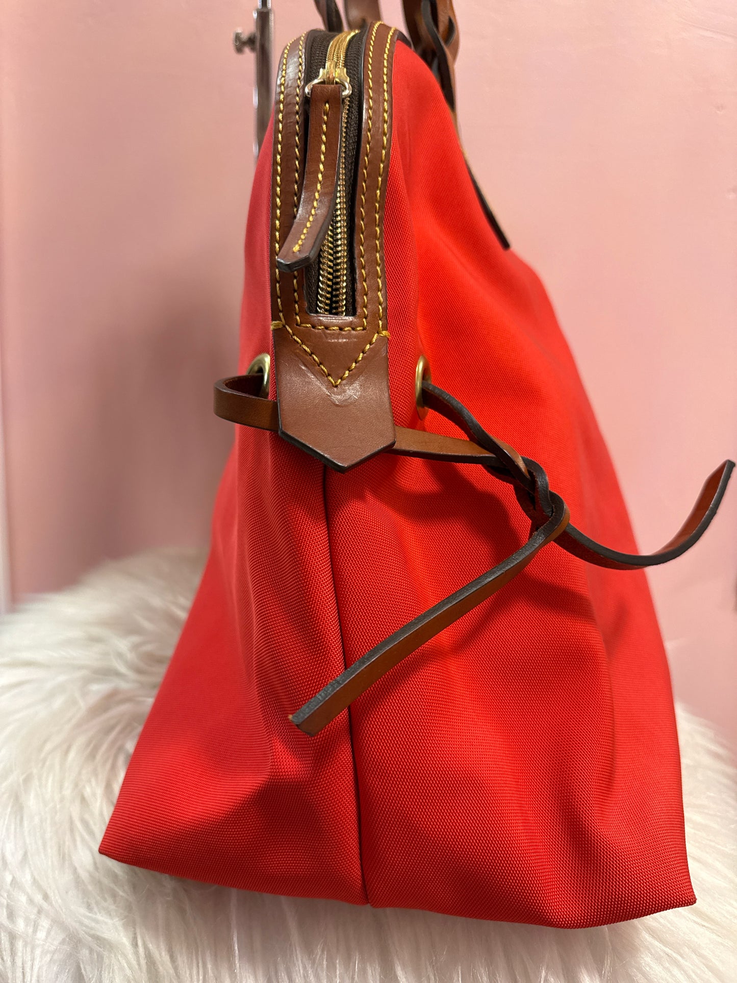 Dooney and Bourke large red domed satchel, braided handles