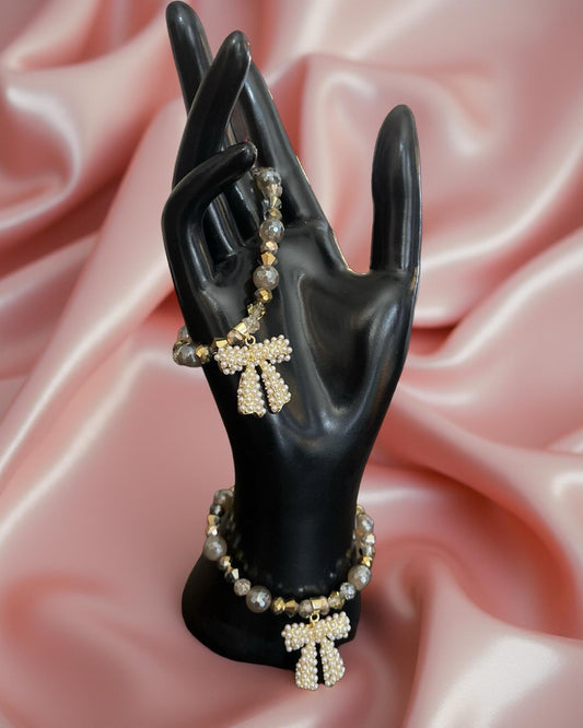 BOW BEAUTIFUL PEARL BOW WITH GOLD, GRAY, TAUPE AND SILVER BEADS BRACELET