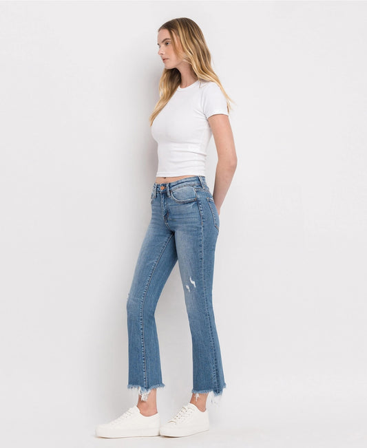 Mid rise distressed raw hem ankle boot cut quince jeans