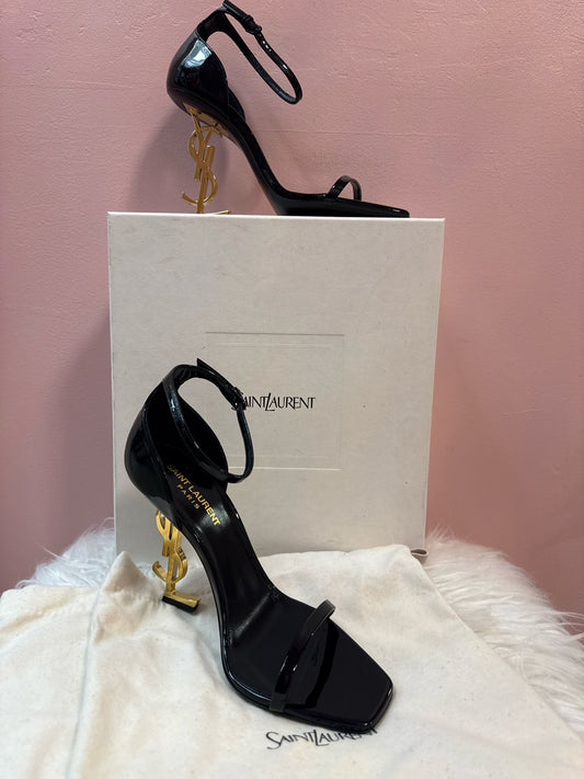 Saint Laurent Opyum patent Leather sandal with Cassandra logo heel